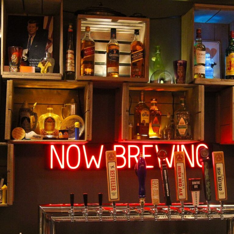 Business photography: a bar with a neon “Now Brewing” sign